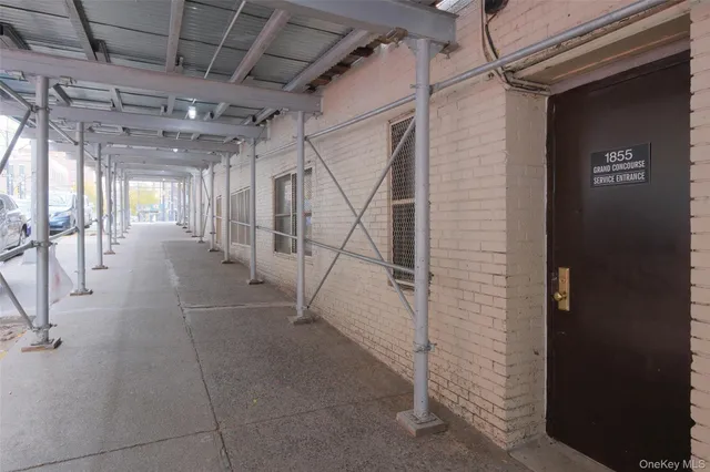 a view of an empty room with a glass door