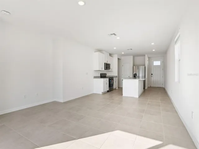 a view of a kitchen with a sink