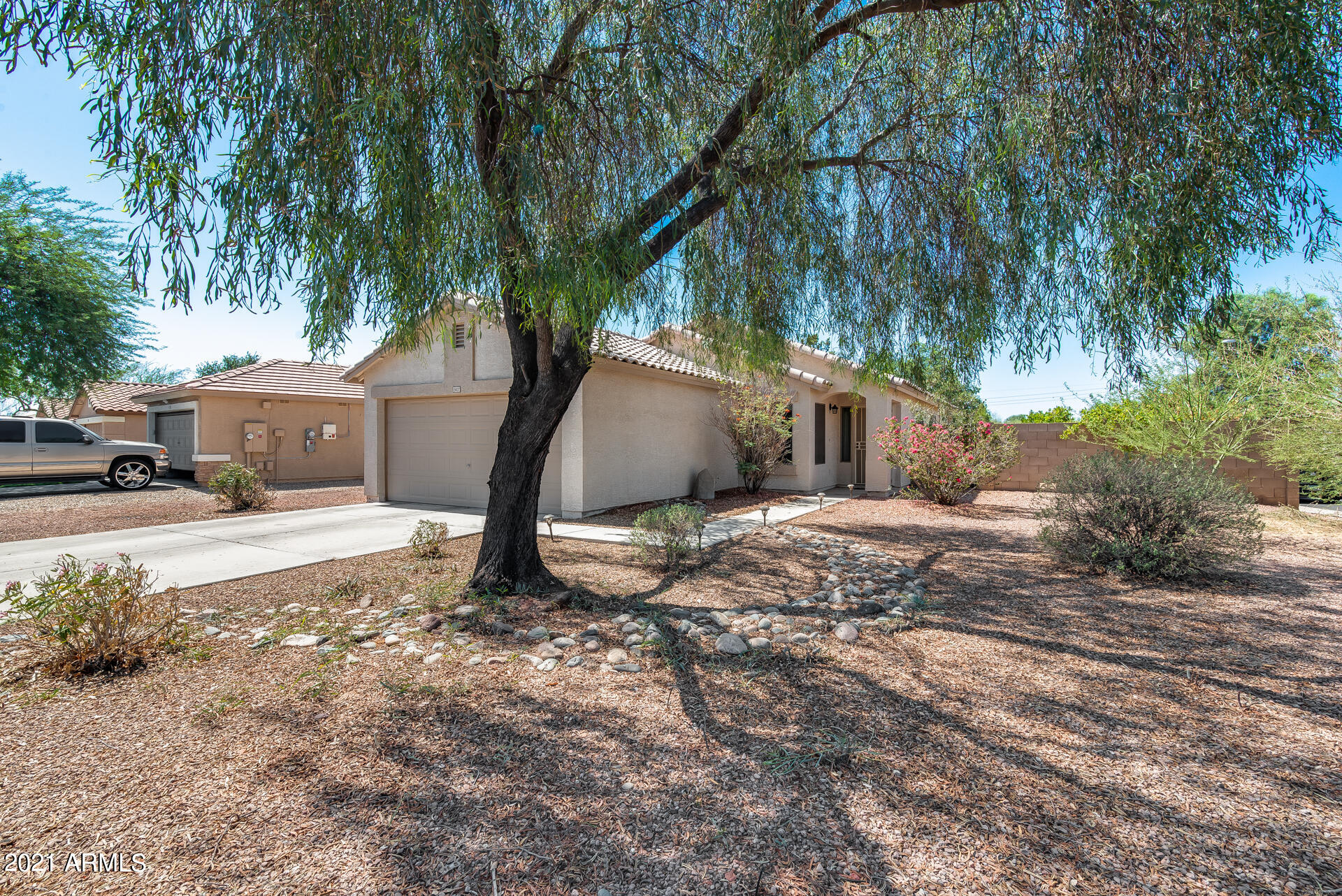 15037 West Calavar Road Surprise, AZ 85379 - Photo 3 of 28 a view of a outdoor space with a house