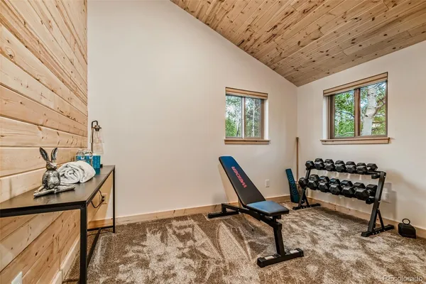 a view of workspace with furniture and windows