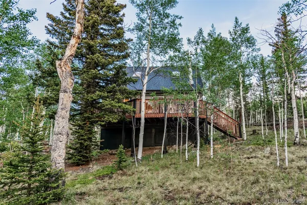 a view of balcony with deck and wooden floor
