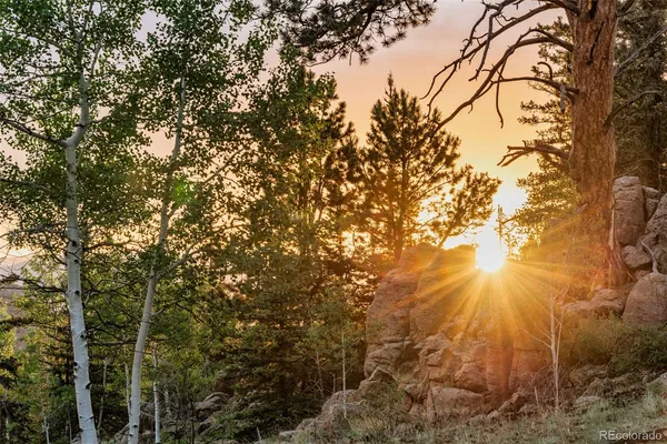 a view of a city with mountains in the background