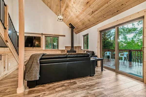 a living room with large windows