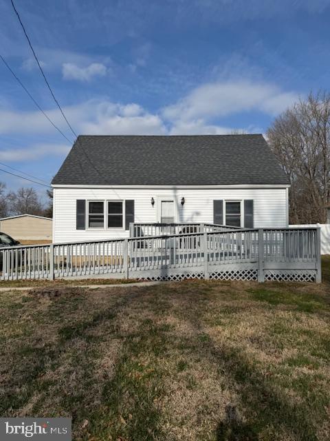 a view of a house with a small yard
