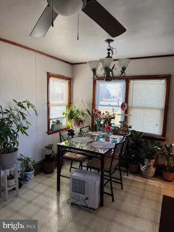 a view of a dining room with furniture