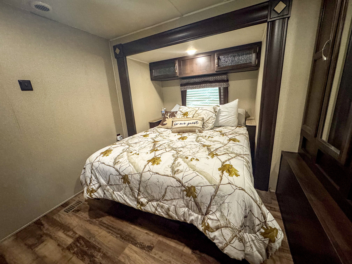 11-113 Woodhaven Sublette, IL 61367 - Photo 12 of 17 a bed sitting in a bedroom next to a window