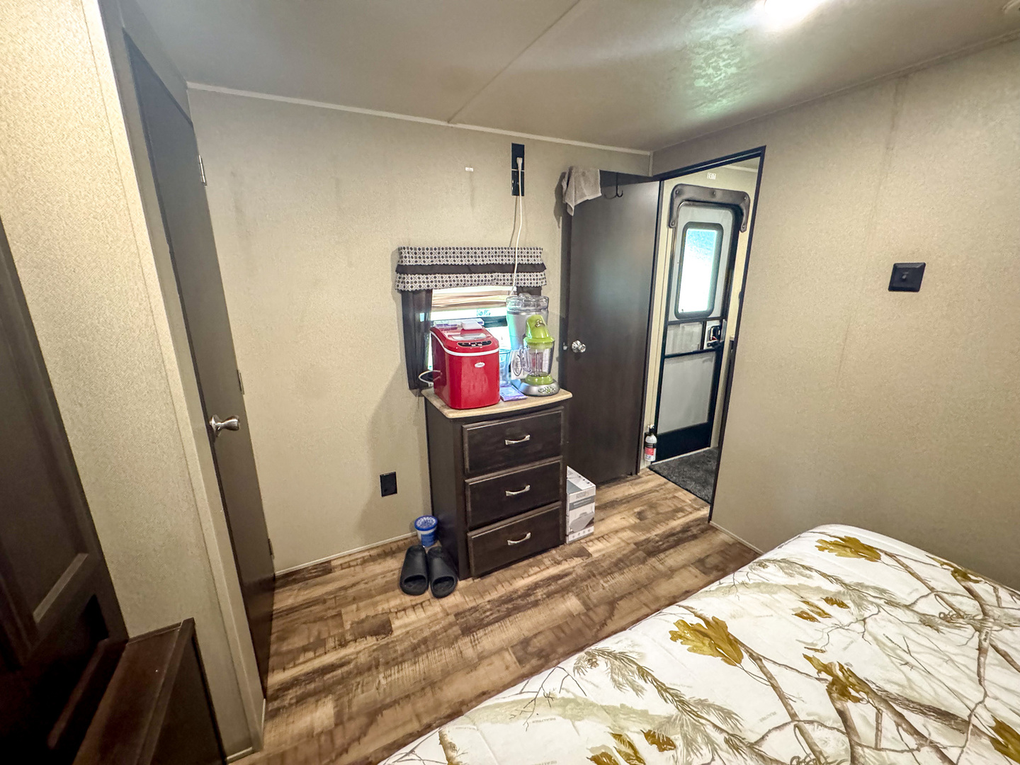 11-113 Woodhaven Sublette, IL 61367 - Photo 13 of 17 a bedroom with a bed and a flat tv screen