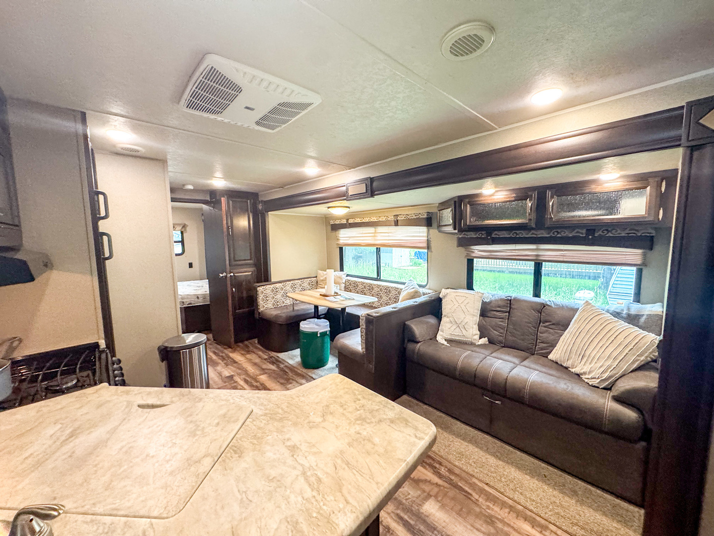 11-113 Woodhaven Sublette, IL 61367 - Photo 7 of 17 a living room with furniture a large window and dresser