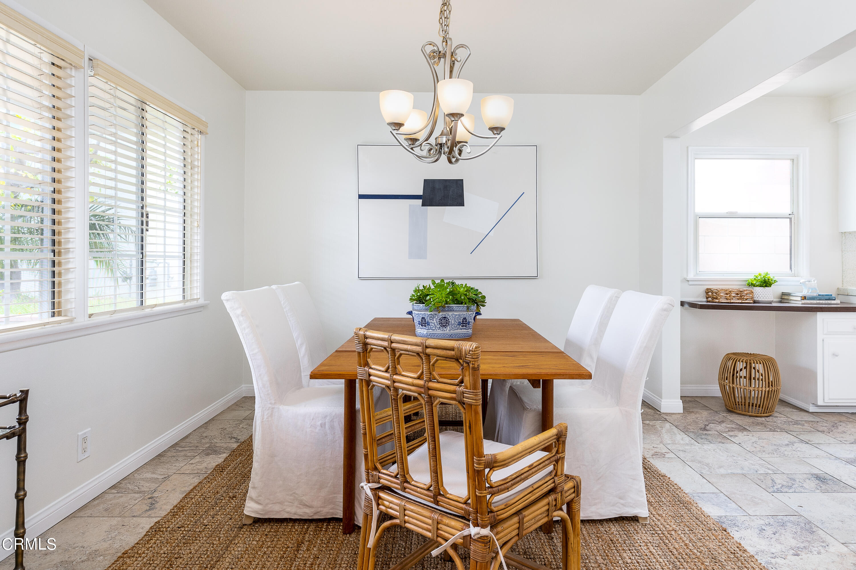 636 Birmingham Road Burbank, CA 91504 - Photo 12 of 25 a view of a dining room with furniture and wooden floor