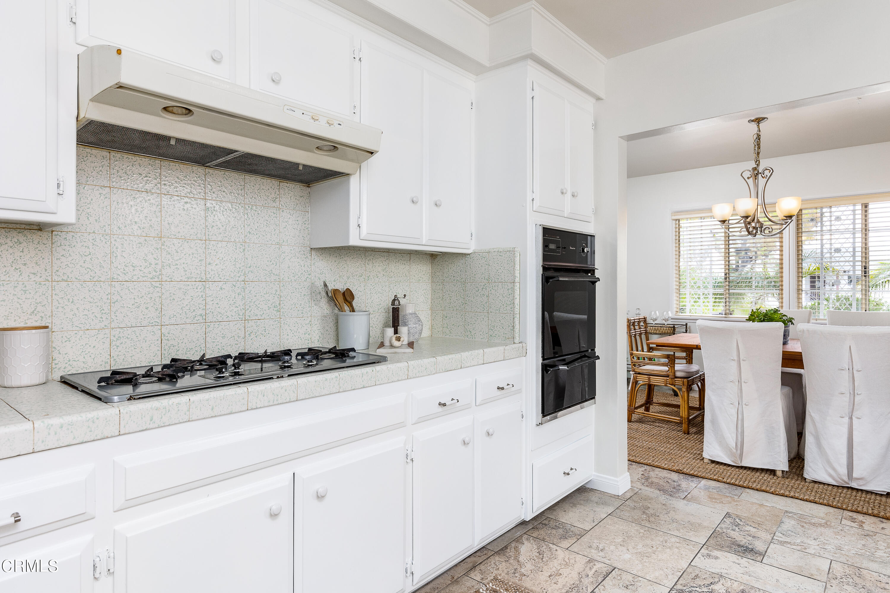 636 Birmingham Road Burbank, CA 91504 - Photo 15 of 25 a kitchen with stainless steel appliances a sink stove and refrigerator