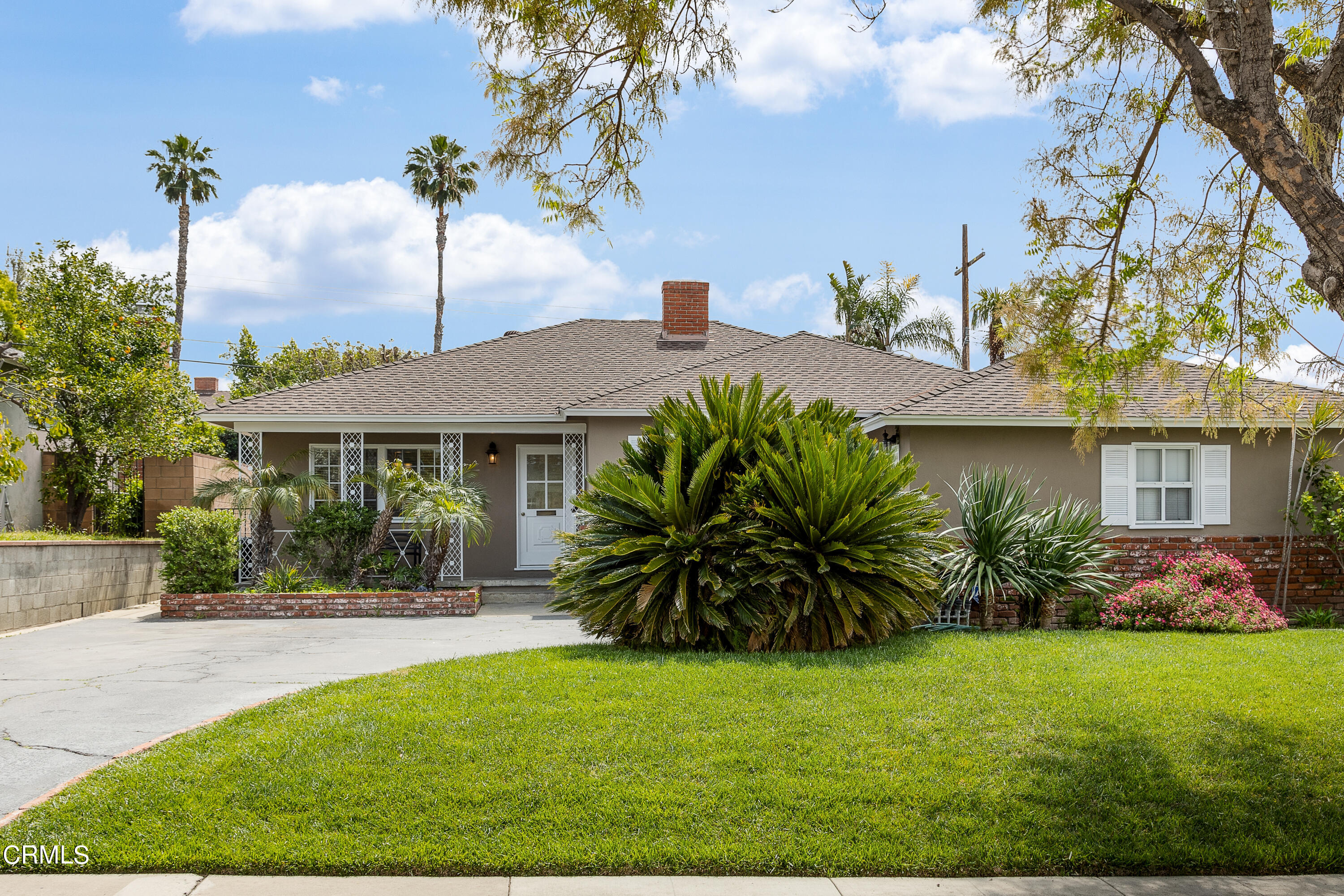 636 Birmingham Road Burbank, CA 91504 - Photo 2 of 25 a front view of house with yard and outdoor seating