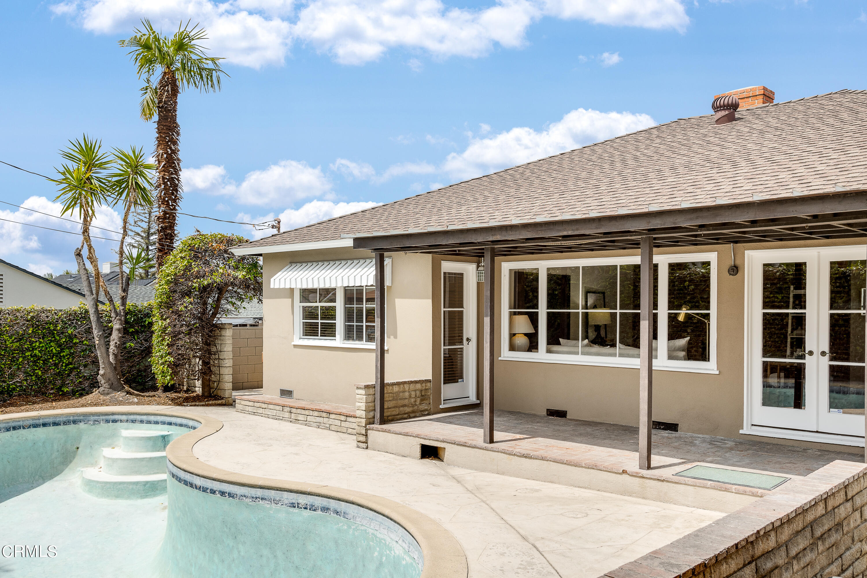 636 Birmingham Road Burbank, CA 91504 - Photo 25 of 25 a house with palm tree in front of it