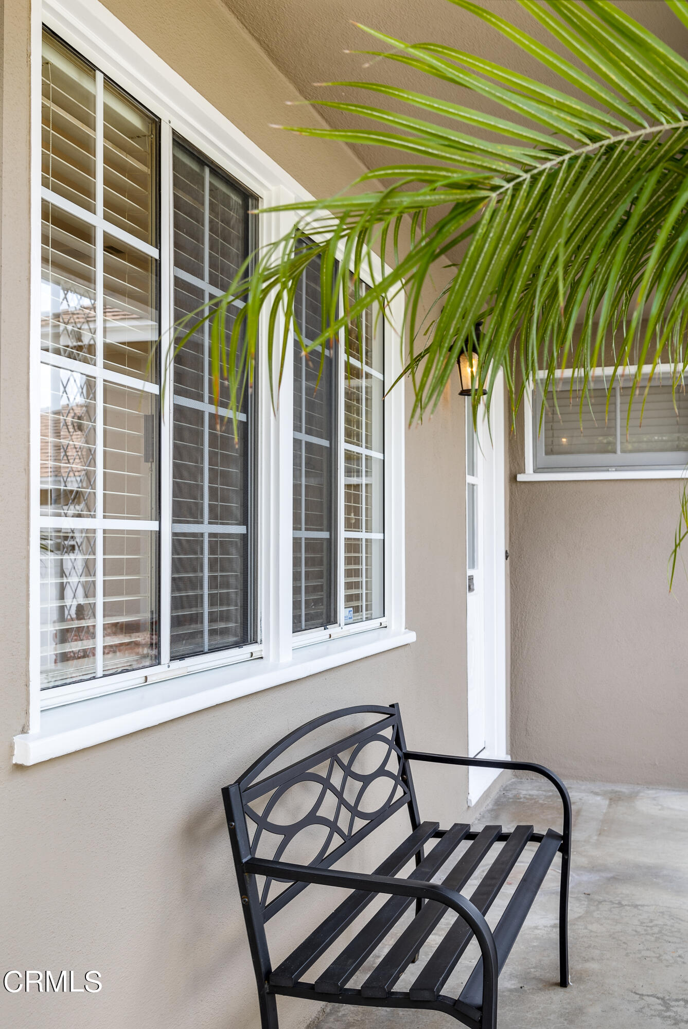 636 Birmingham Road Burbank, CA 91504 - Photo 5 of 25 a view of a house with a large window and wooden fence