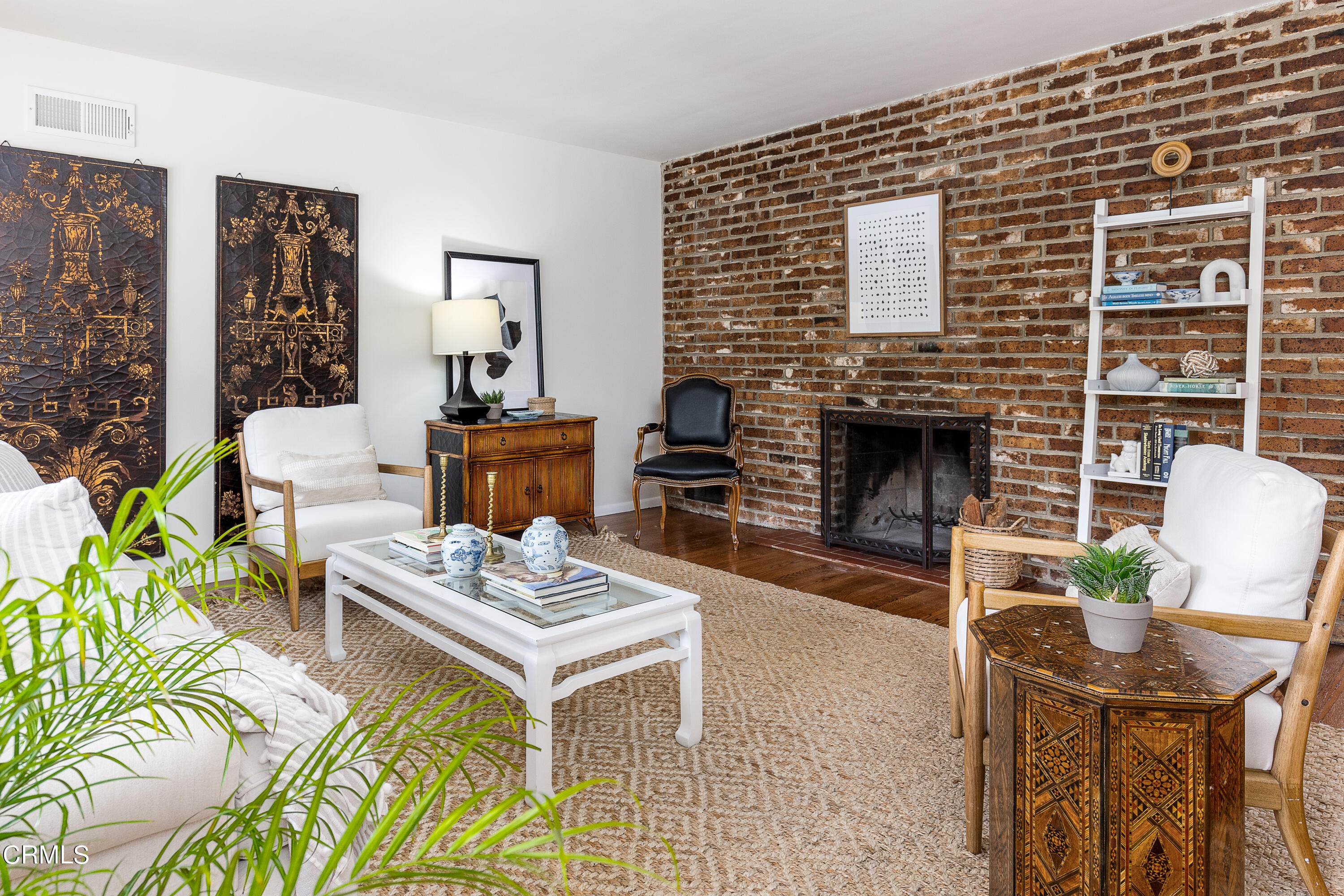 636 Birmingham Road Burbank, CA 91504 - Photo 9 of 25 a living room with furniture and a fireplace