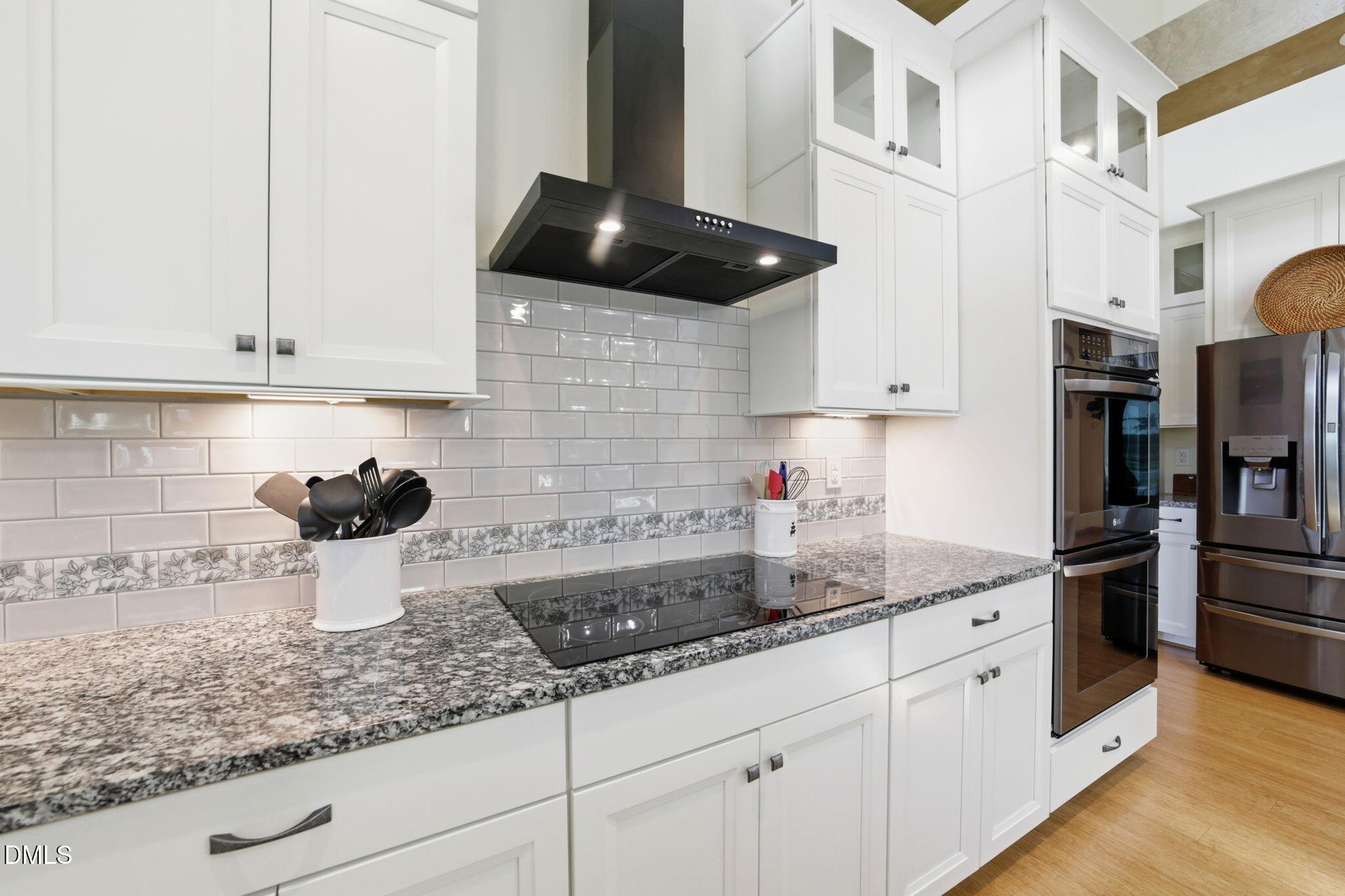 35 North Rippling Court Smithfield, NC 27577 - Photo 13 of 59 a kitchen with stainless steel appliances granite countertop a sink a stove and cabinets