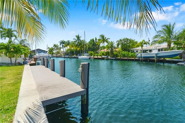 a view of a swimming pool and lounge chair