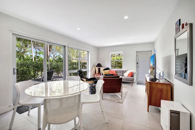 a bedroom with furniture and a dresser