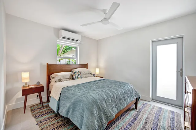 a kitchen with cabinets appliances a sink and a counter top space