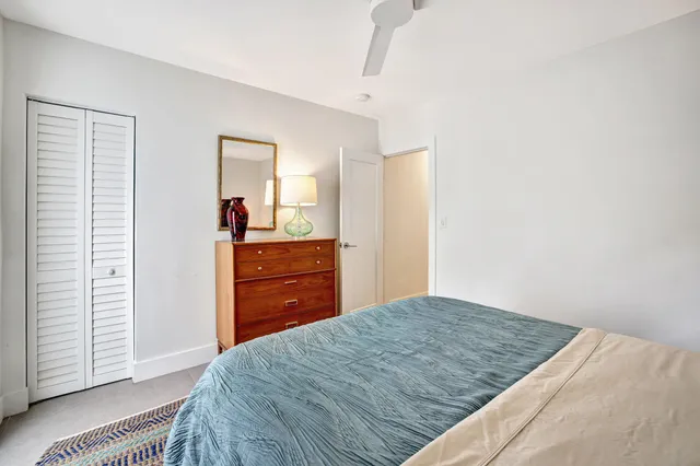 a kitchen with a refrigerator and a sink