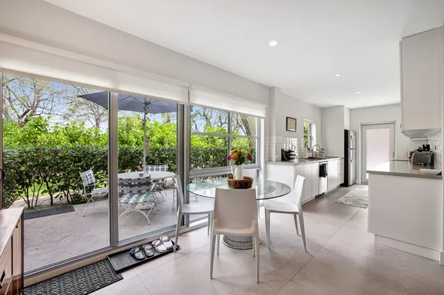 a kitchen with a stove microwave and refrigerator