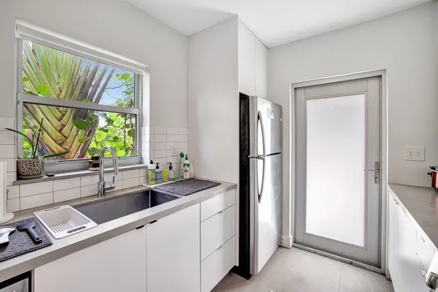 a front view of a house with entertaining space