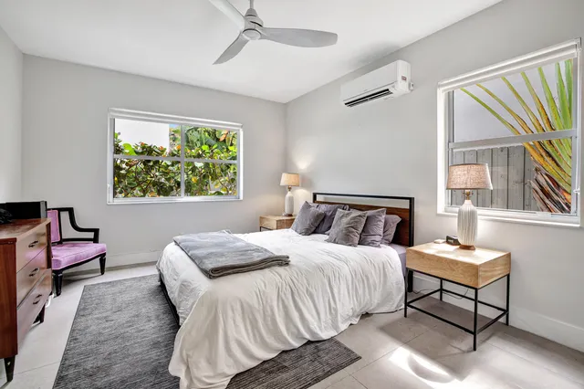 a kitchen with stainless steel appliances a stove a refrigerator and cabinets