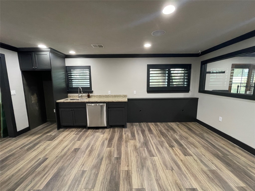 408 Wilson Road Conroe, TX 77301 - Photo 11 of 32 a large kitchen with a large window