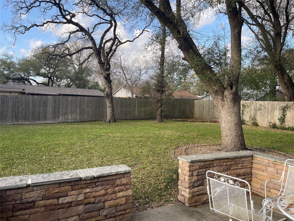 408 Wilson Road Conroe, TX 77301 - Photo 25 of 32 a view of outdoor space yard and patio