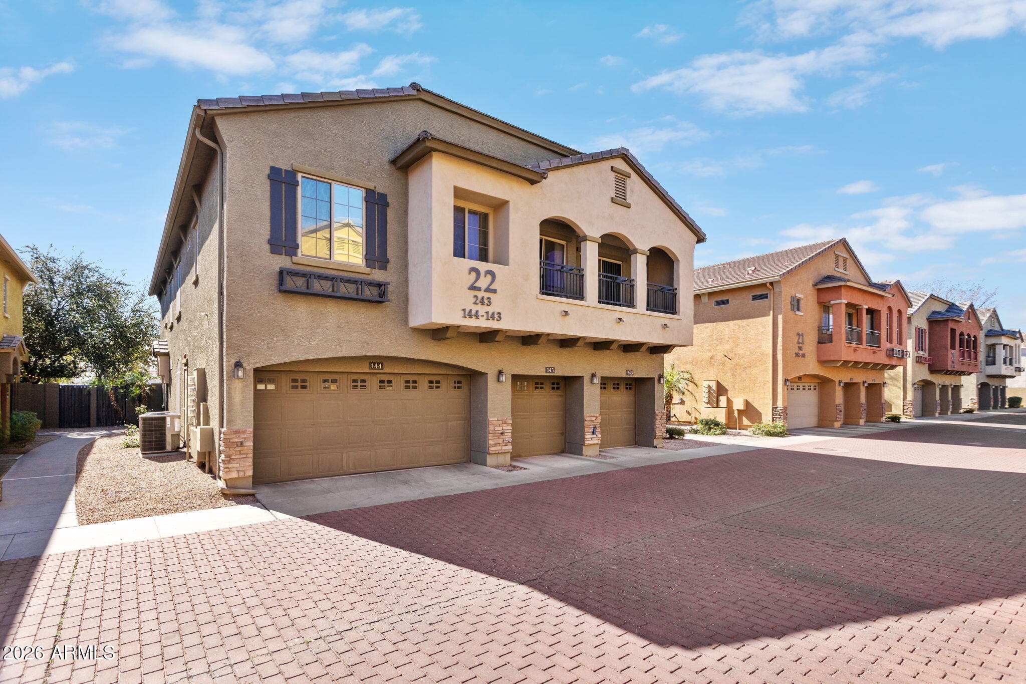 17150 North 23rd Street, Unit 243 Phoenix, AZ 85022 - Photo 1 of 24 a front view of a house with a yard