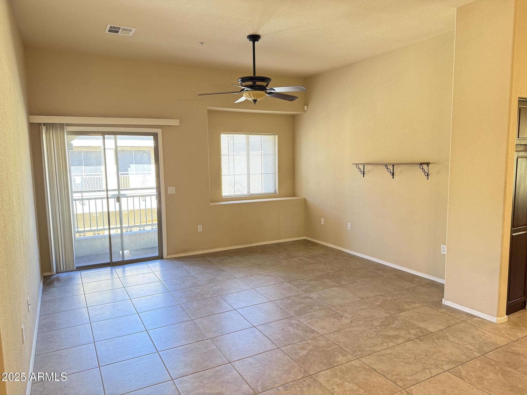 17150 North 23rd Street, Unit 243 Phoenix, AZ 85022 - Photo 13 of 36 a view of an empty room with a window