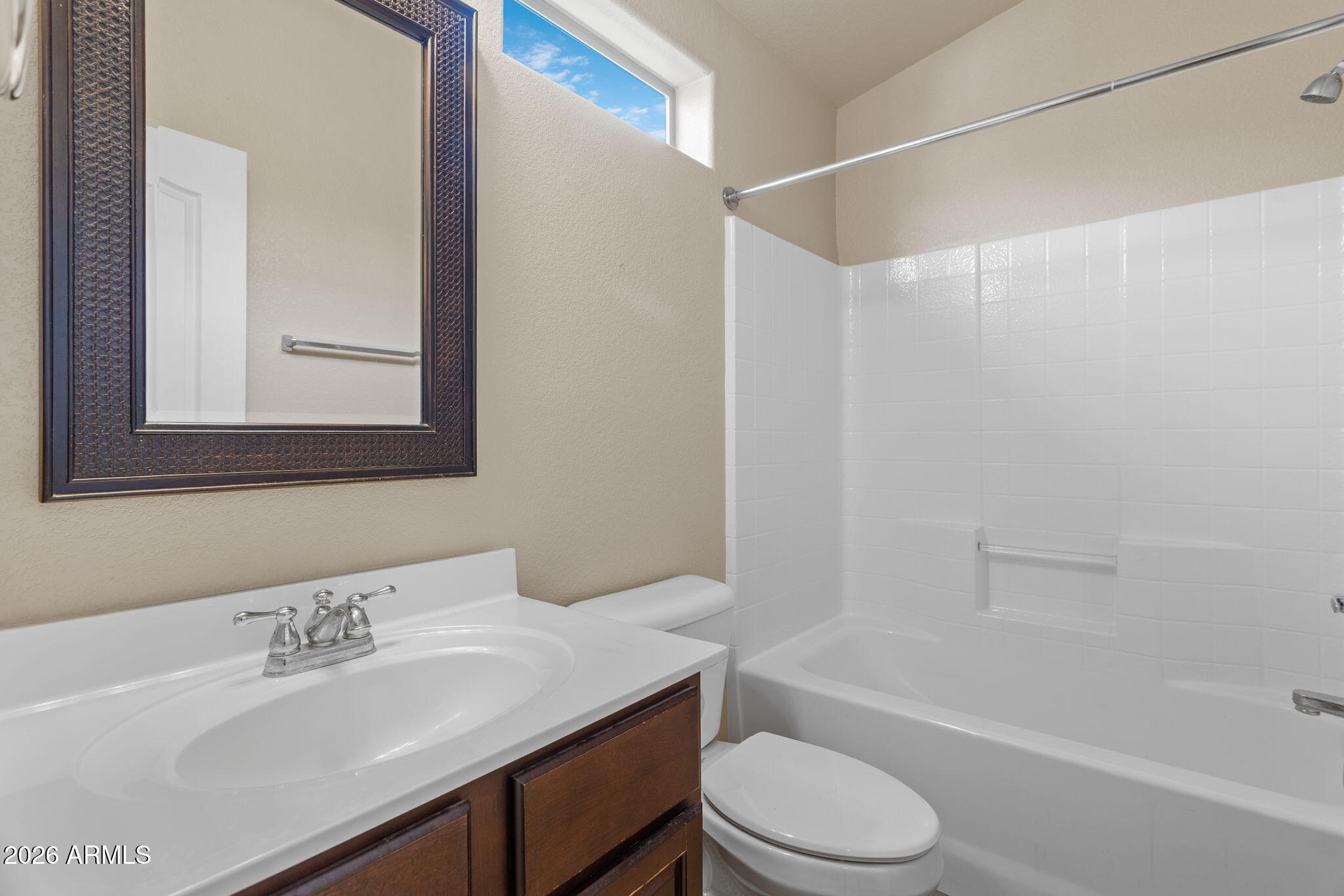 17150 North 23rd Street, Unit 243 Phoenix, AZ 85022 - Photo 20 of 24 a bathroom with a sink toilet and shower