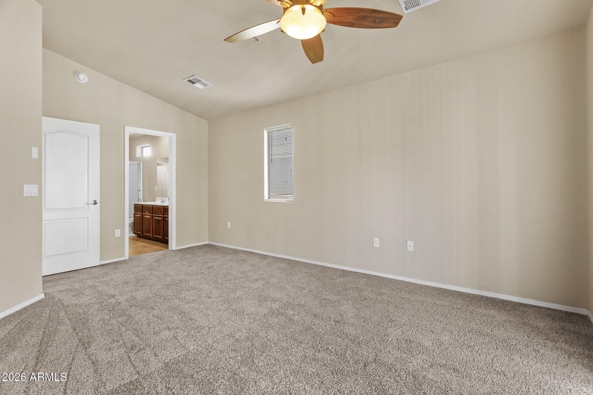 17150 North 23rd Street, Unit 243 Phoenix, AZ 85022 - Photo 21 of 24 wooden floor in an empty room with a window