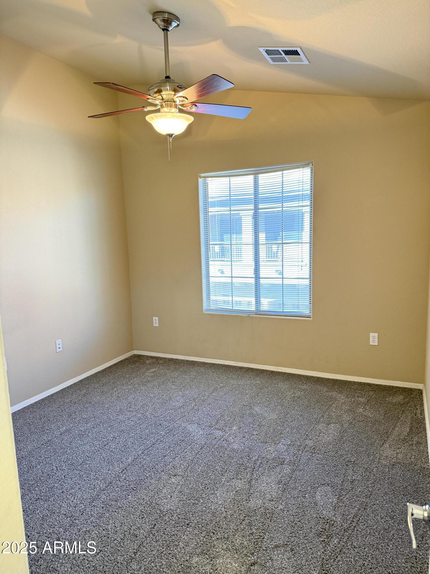 17150 North 23rd Street, Unit 243 Phoenix, AZ 85022 - Photo 22 of 36 a view of an empty room with a window
