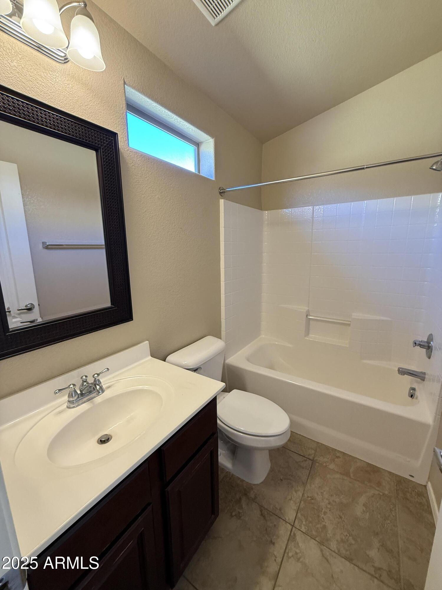17150 North 23rd Street, Unit 243 Phoenix, AZ 85022 - Photo 29 of 36 a bathroom with a sink a toilet and a bathtub