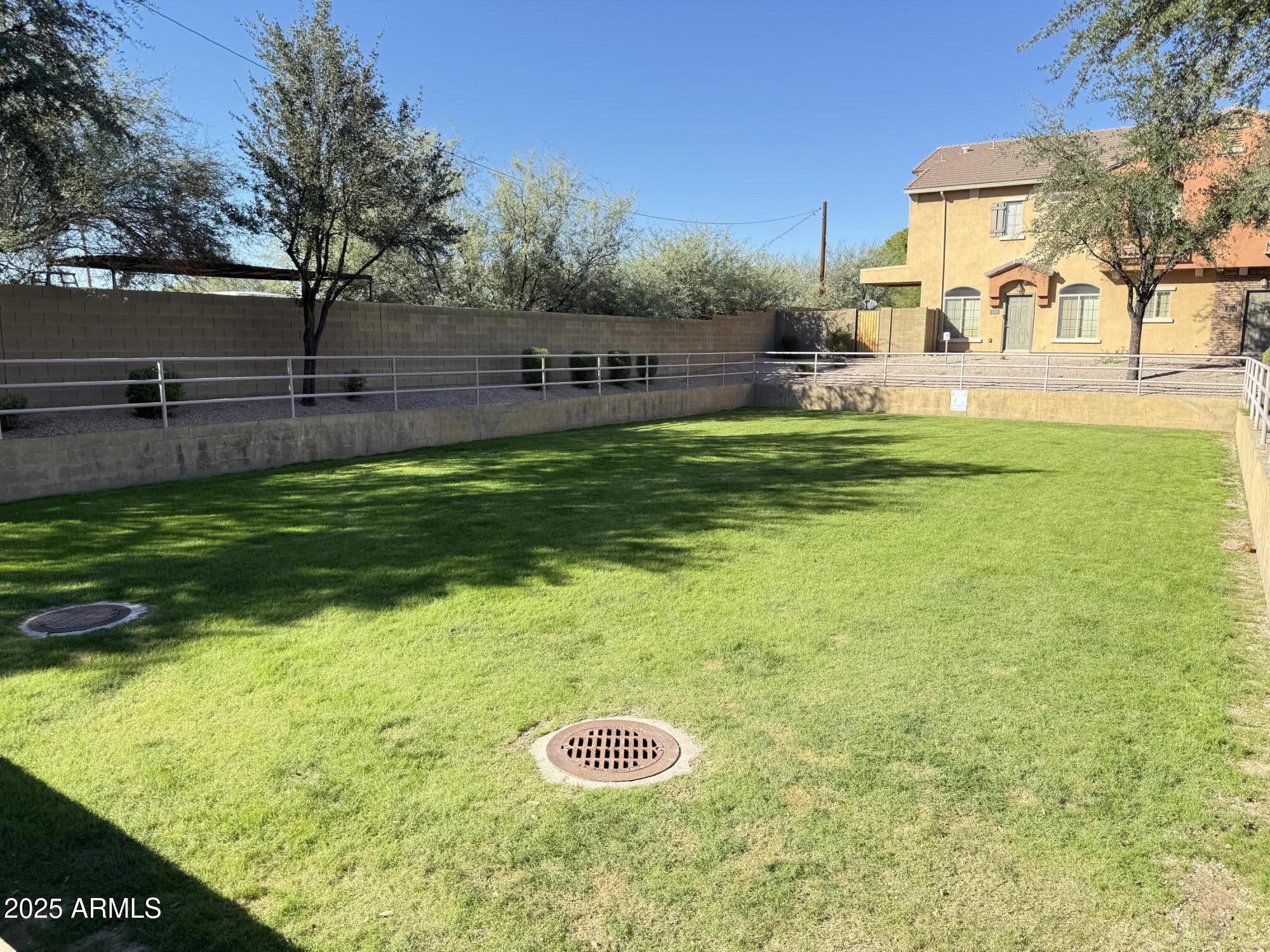 17150 North 23rd Street, Unit 243 Phoenix, AZ 85022 - Photo 36 of 36 a view of outdoor space with deck and yard