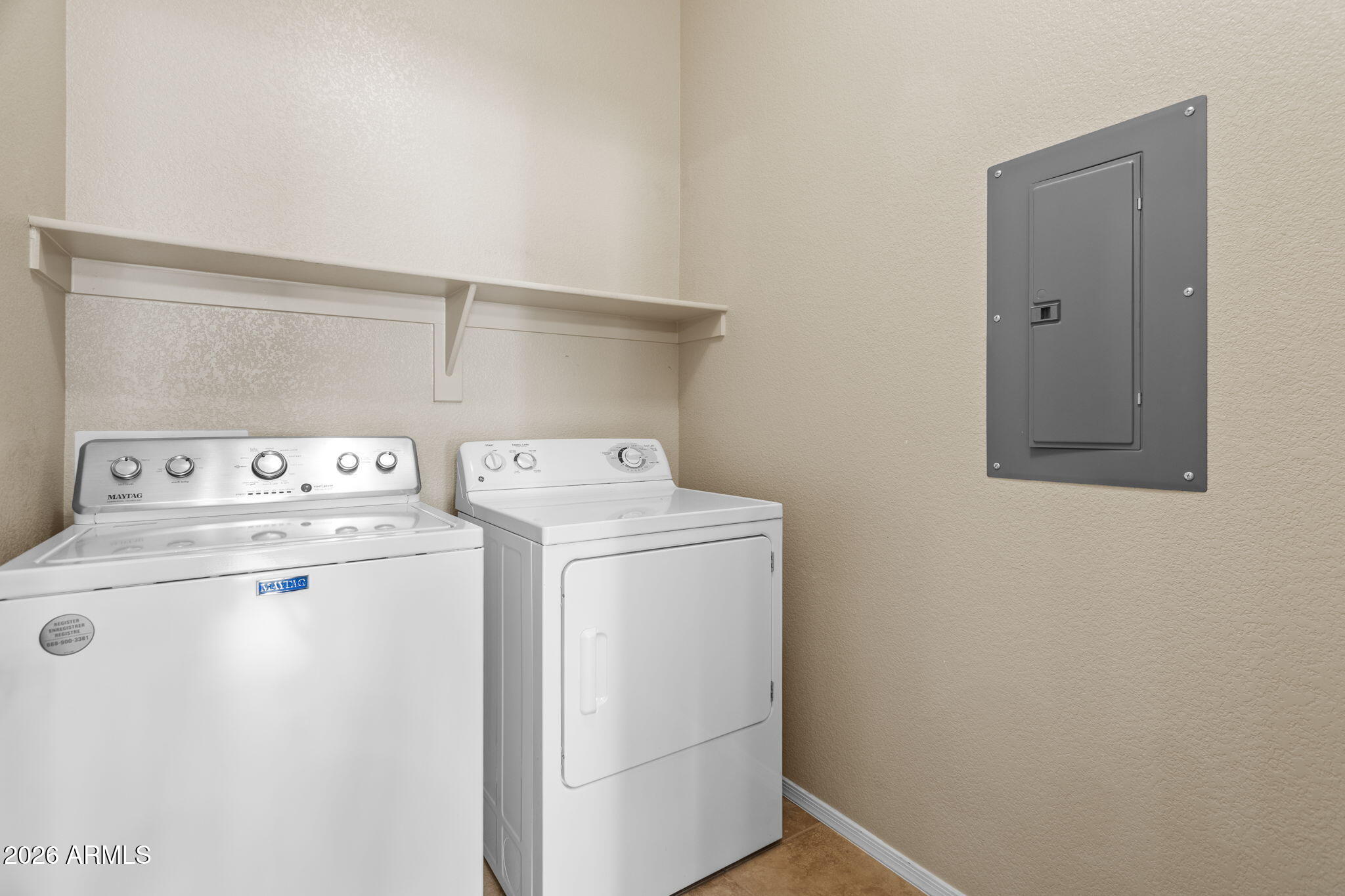 17150 North 23rd Street, Unit 243 Phoenix, AZ 85022 - Photo 4 of 24 a utility room with dryer and washer