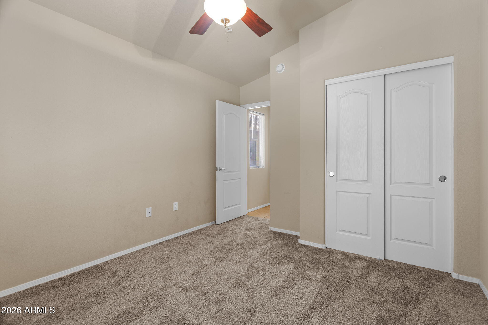 17150 North 23rd Street, Unit 243 Phoenix, AZ 85022 - Photo 5 of 24 an empty room with closet area