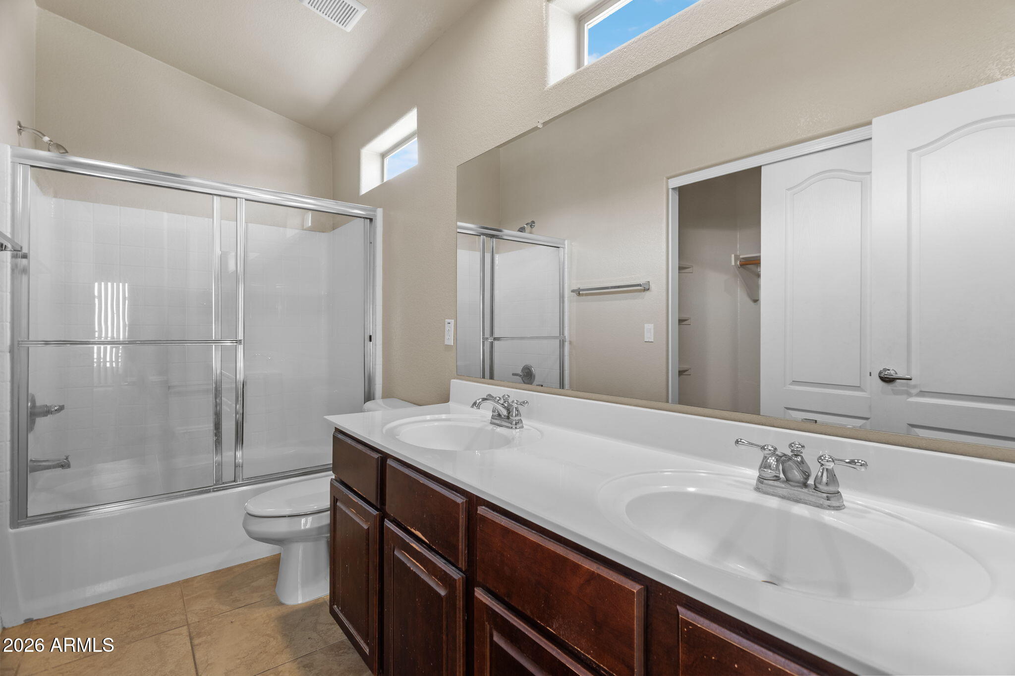 17150 North 23rd Street, Unit 243 Phoenix, AZ 85022 - Photo 6 of 24 a bathroom with a sink a toilet and shower