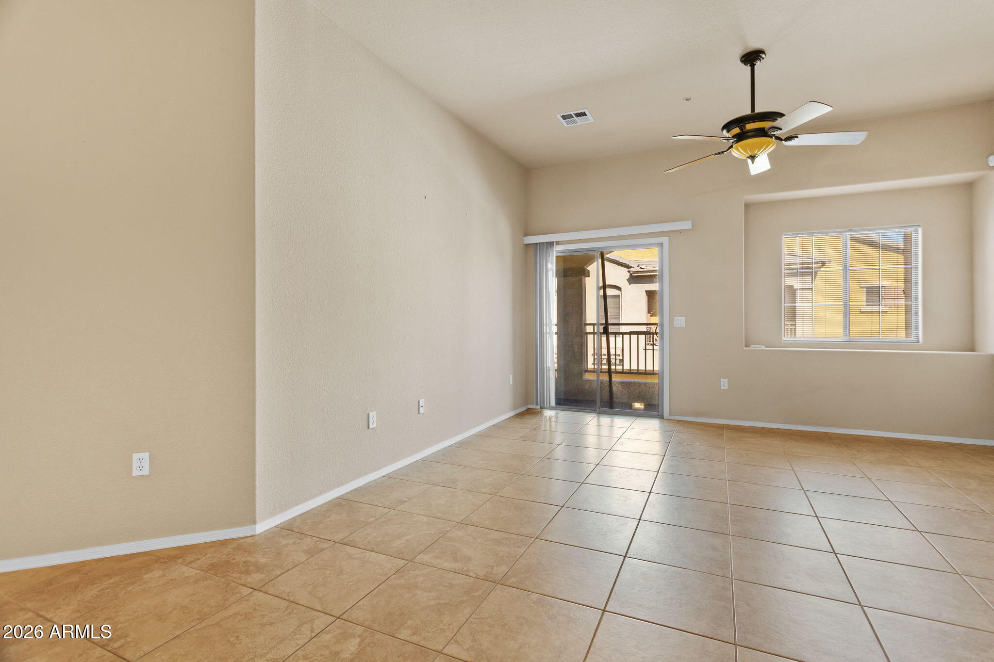 17150 North 23rd Street, Unit 243 Phoenix, AZ 85022 - Photo 10 of 24 a view of an empty room with a window