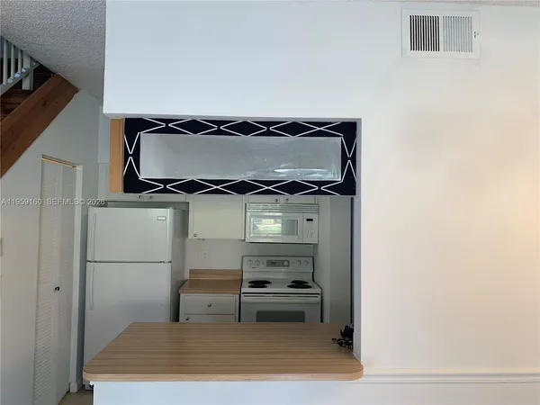 a room with storage and utility