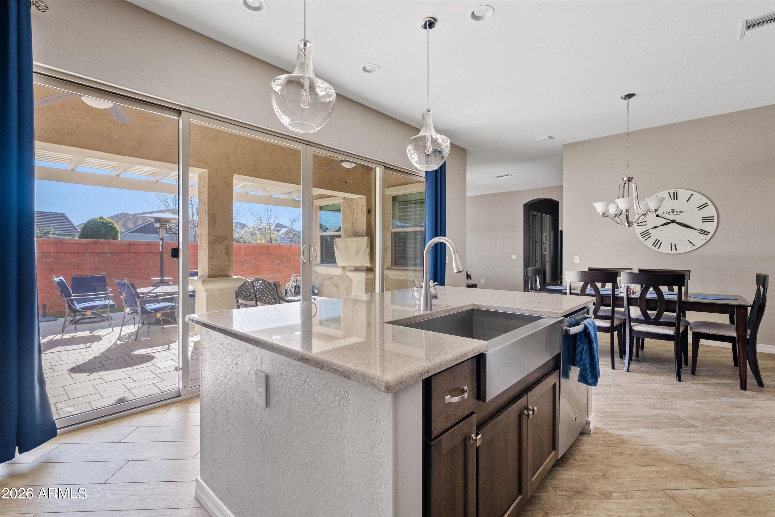 4405 East Dwayne Street Gilbert, AZ 85295 - Photo 17 of 38 a kitchen with granite countertop a sink and counter space