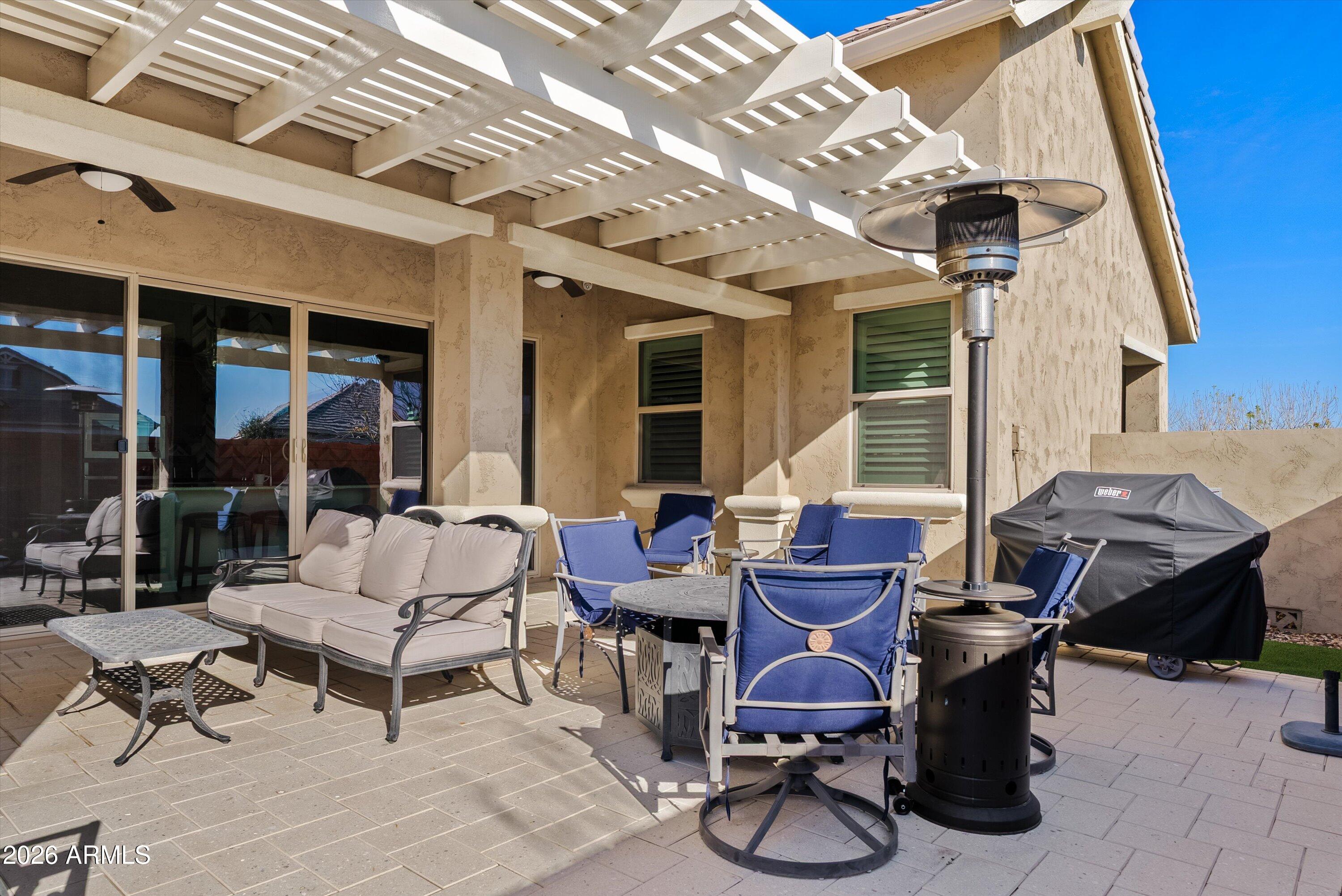 4405 East Dwayne Street Gilbert, AZ 85295 - Photo 30 of 38 a patio with patio couch and table