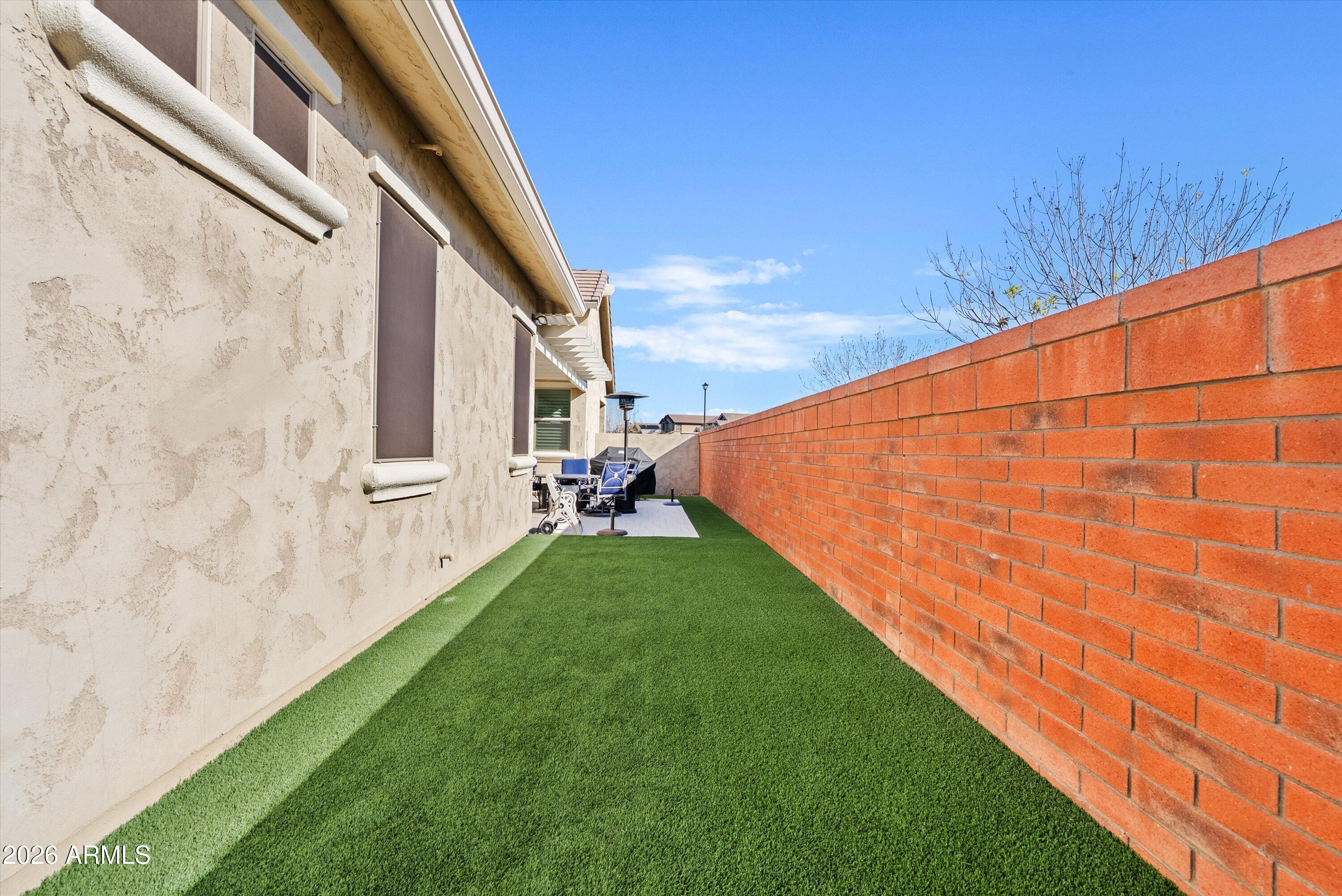 4405 East Dwayne Street Gilbert, AZ 85295 - Photo 31 of 38 a view of a backyard with sitting area