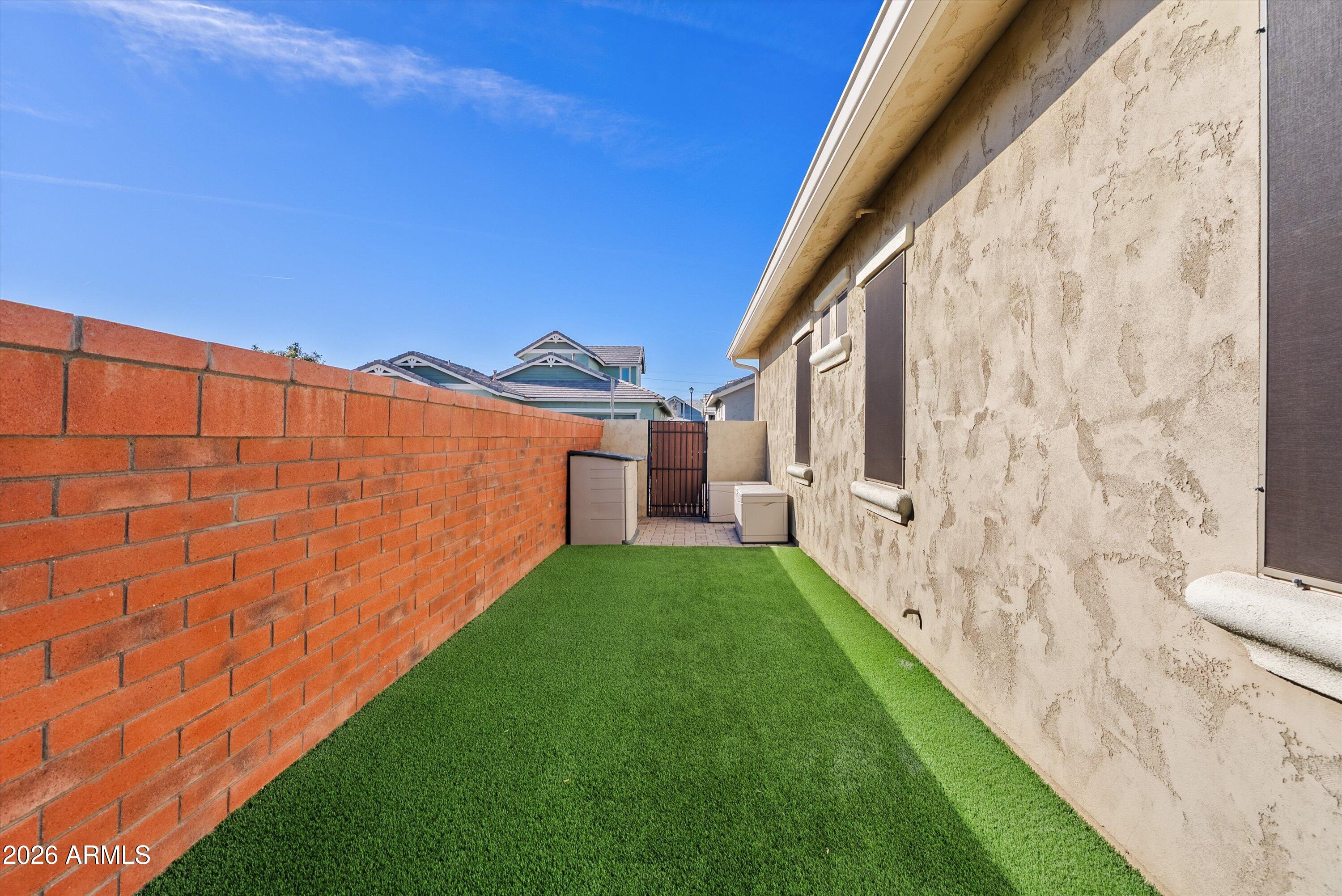 4405 East Dwayne Street Gilbert, AZ 85295 - Photo 32 of 38 a view of an entrance to house with yard