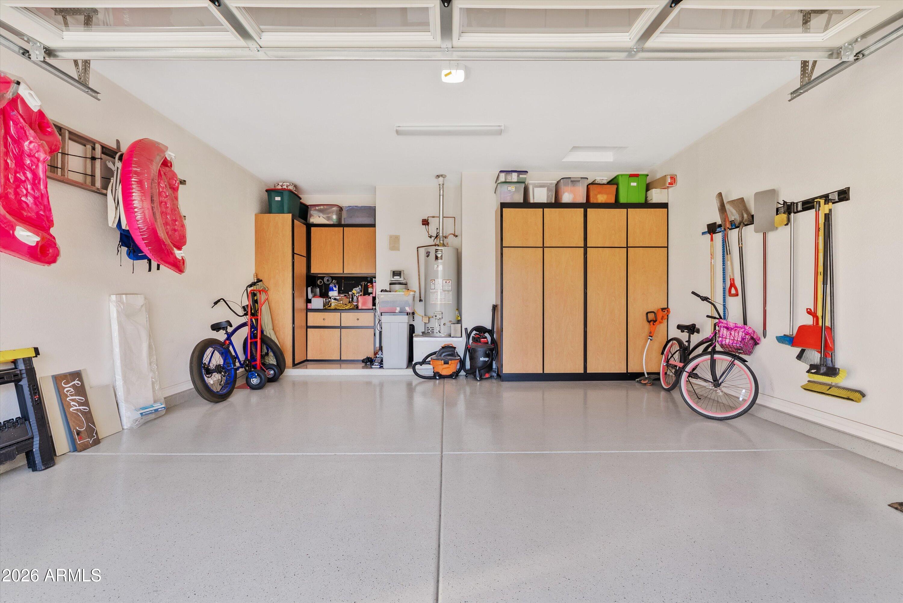 4405 East Dwayne Street Gilbert, AZ 85295 - Photo 33 of 38 a view of a garage with rack and bicycle