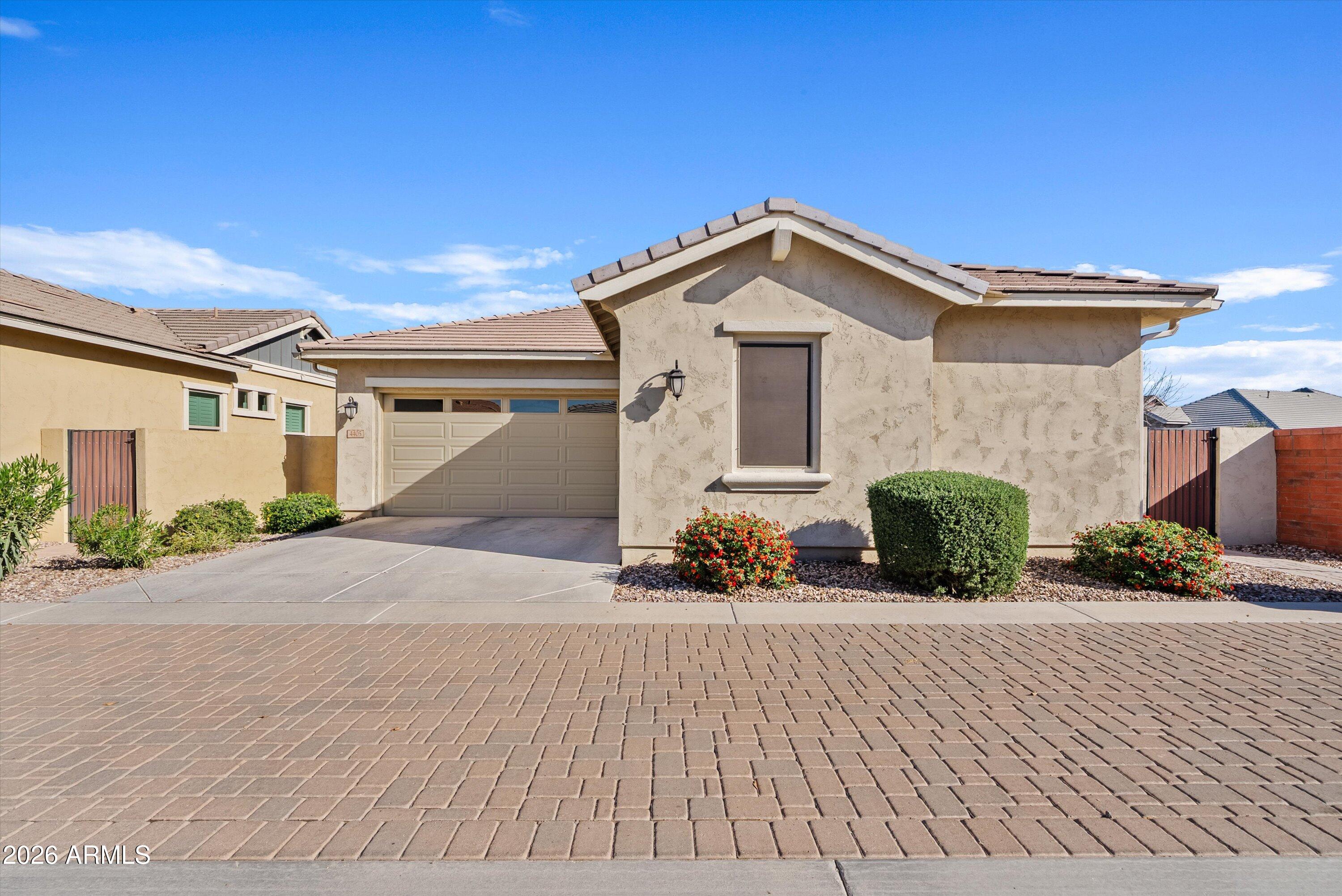 4405 East Dwayne Street Gilbert, AZ 85295 - Photo 34 of 38 a front view of a house with a yard