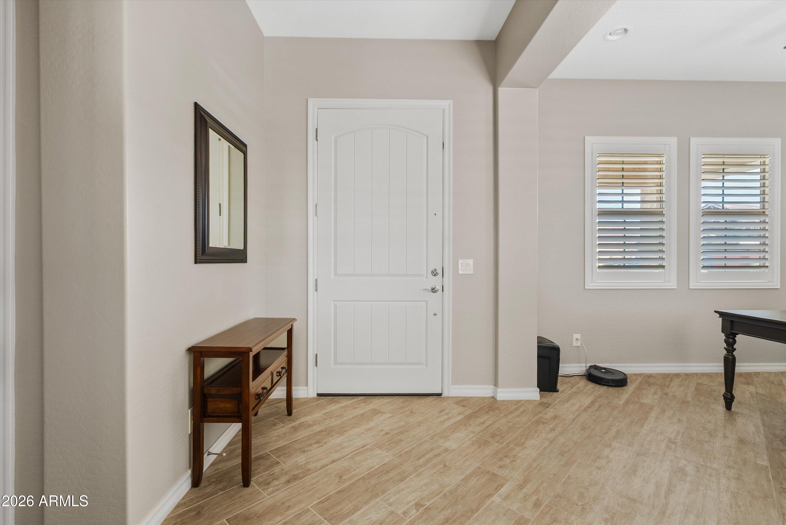 4405 East Dwayne Street Gilbert, AZ 85295 - Photo 5 of 38 a view of a livingroom with a workspace