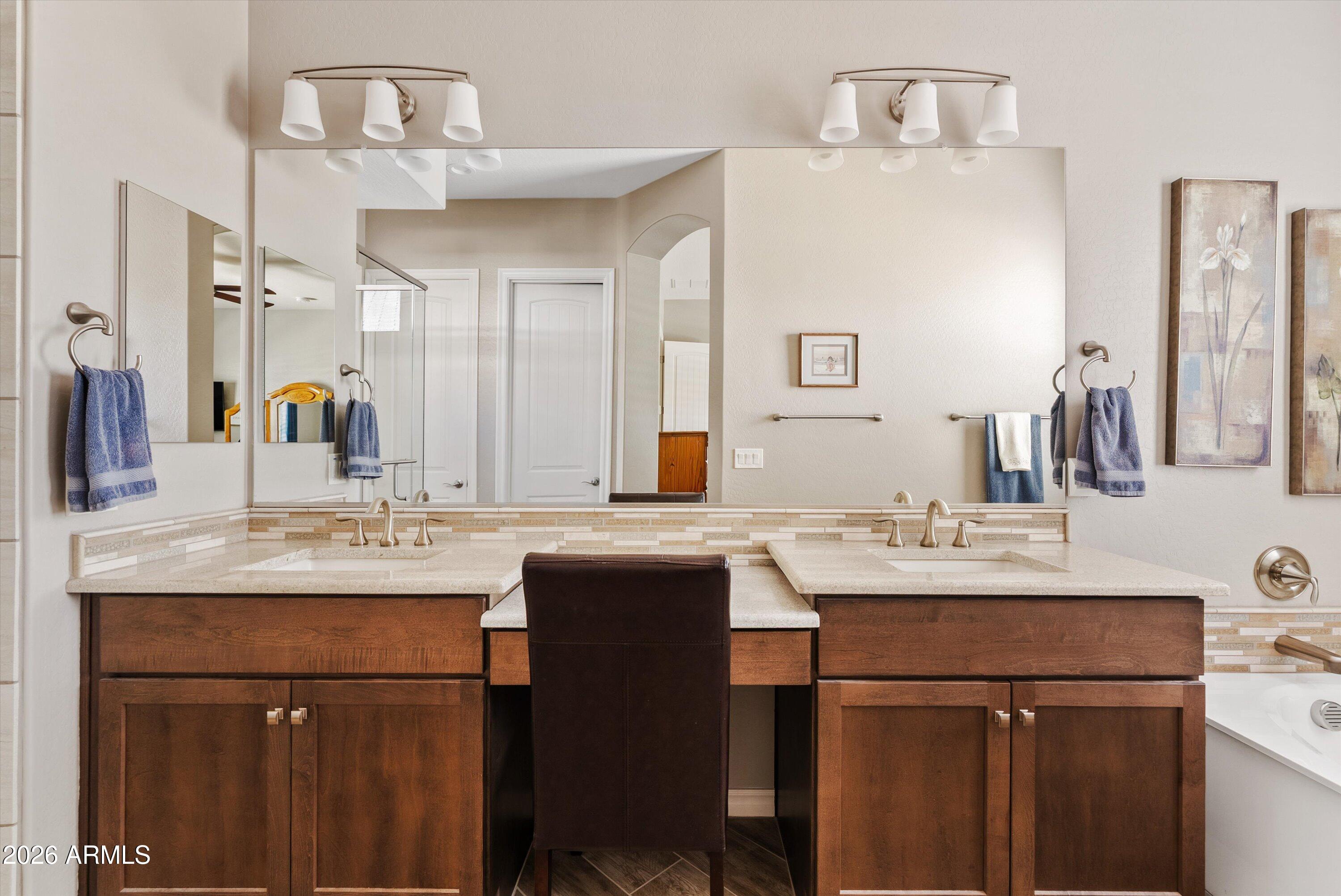 4405 East Dwayne Street Gilbert, AZ 85295 - Photo 9 of 38 a bathroom with a sink and a mirror