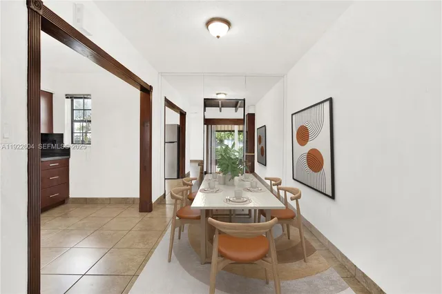 a living room with furniture and window