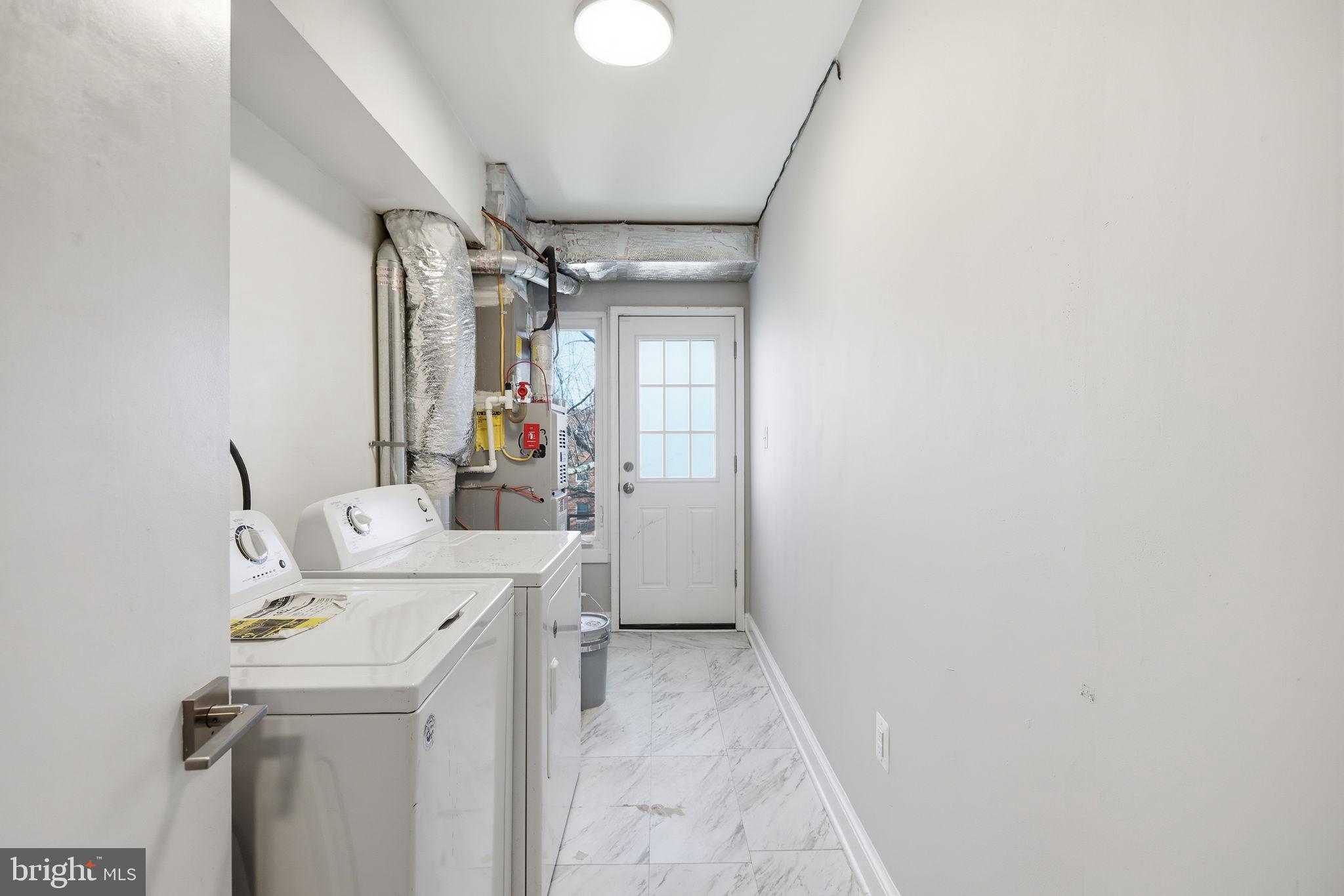 422 Burbank Street Southeast Washington, DC 20019 - Photo 19 of 23 a utility room with dryer and washer